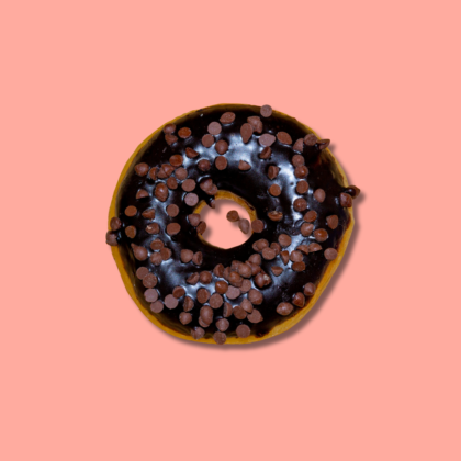 Chocolate chip donut with crunchy toppings – Go Nuts Donuts