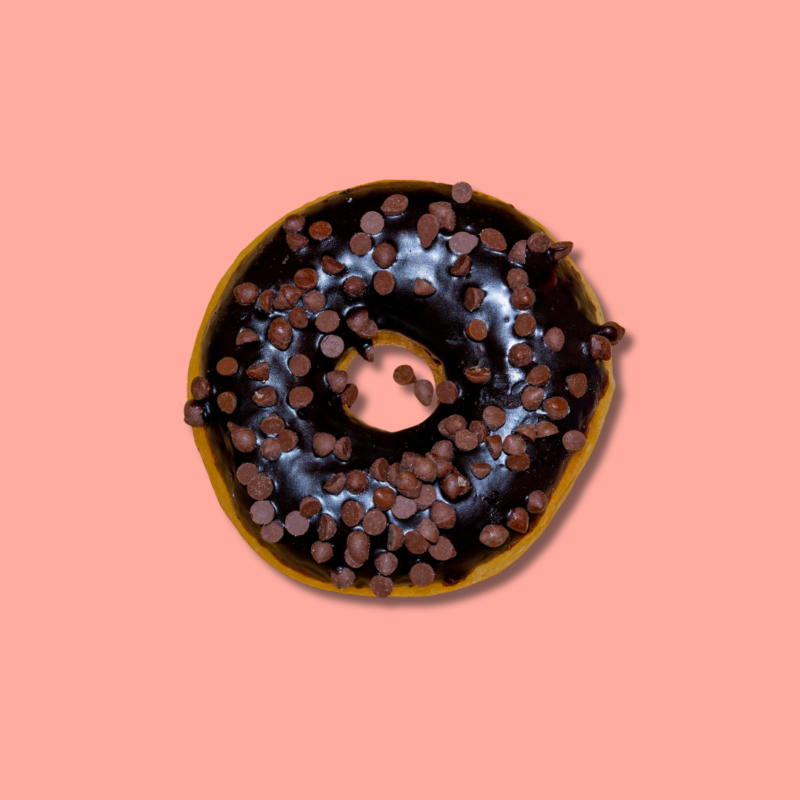 Chocolate chip donut with crunchy toppings – Go Nuts Donuts